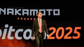 Ross Ulbricht, who created Silk Road, a dark web market that used Bitcoin to facilitate millions of dollars in drug sales, takes the stage to speak at Bitcoin 2025, a cryptocurrency convention at the Venetian Resort in Las Vegas, May 29, 2025. (Gabriela Bhaskar/ The New York Times)