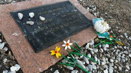 Tributes lay on a memorial Friday, Sept. 26, 2025, for four teenage girls who were killed in a yogurt shop in 1991 in Austin, Texas. (AP Photo/Paul J. Weber)