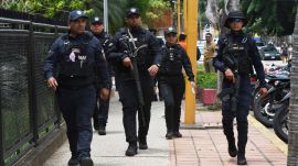 Police officers stand guard after being mobilized in Valencia, Venezuela, Thursday, Sept 11, 2025. (AP Photo/Jacinto Oliveros)