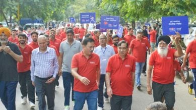 People participate in Walkathon 2025 on World Heart Day, organised by Dr H K Bali's Heart Foundation and Livasa Hospital, in Sector 71, Mohali, on Sunday. (Express Photo)