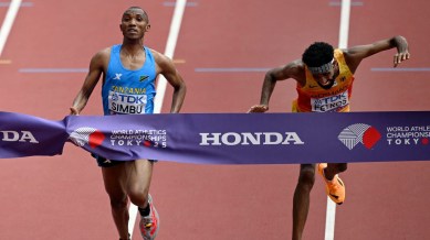 Alphonce Simbu (L) edged out Amanal Petros of Germany in the men's marathon by 0.03s at the World Athletics Championships 2025. (Photo: Reuters)