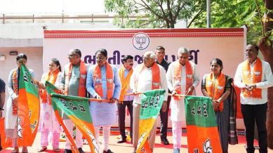 Gandhinagar, Sep 11 (ANI): Gujarat Chief Minister Bhupendar Patel flags off trucks carrying kits of essential items, household goods, food packets, etc for the flood's victims of Chhattisgarh, in Gujarat on Thursday. (@BhupendrapbjpX/ANI Photo)