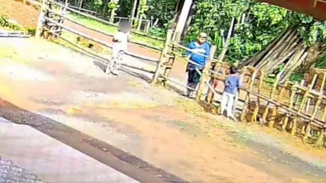 The incident was captured on a CCTV camera at the farm, which shows Kariyappa falling to the ground after his younger brother pulls the trigger on an air gun held by the caretaker, Nitish Gouda, 40.