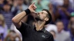 Novak Djokovic was goading the crowd that had been mercilessly trying to deter him. (AP Photo)