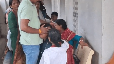 Family members of the slain policemen at the hospital