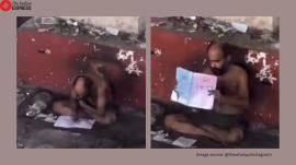 homeless man studying outside metro station