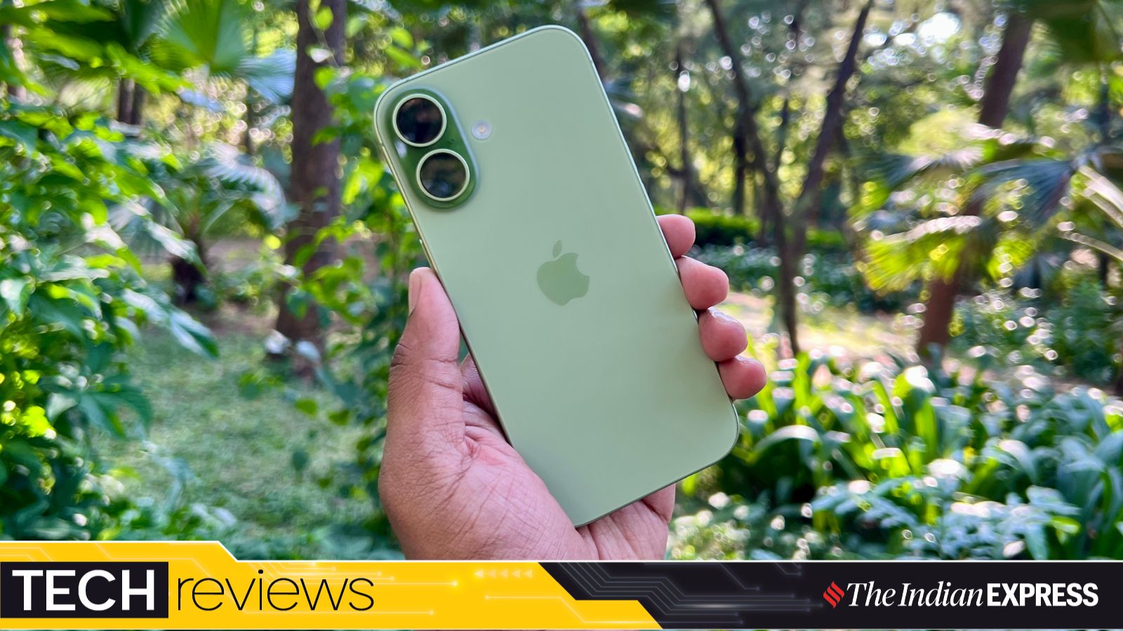 Sage-green iPhone 17 shown outdoors, highlighting its sleek dual-camera design and pastel finish. (Image: Bijin Jose/The Indian Express)