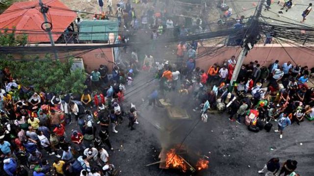Prisoners burn furniture and other items outside the Dilli Bazaar jail as they try to break out, following protests against the killing of 19 people after anti-corruption protests triggered by a social media ban, which was later lifted, in Kathmandu on Wednesday. (Reuters/ANI Photo)