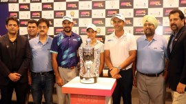 Golfers Gaganjeet Bhullar, Aadil Bedi and Nehal Tripathi along with officials with the trophy of IGPL Tour during a press conference in Chandigarh on Monday. Kamleshwar Singh