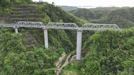 The Hortoki–Sairang section lies in a hilly terrain and includes 32 tunnels and 35 major bridges.
