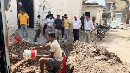 Workers of health department check a water pipeline. Express