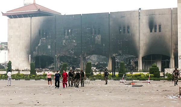 Kathmandu, Sep 10 (ANI): A view of the Parliament building, which was set on fire amid the violent protest over alleged corruption, in Kathmandu on Wednesday. (ANI Video Grab)