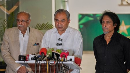 Pakistan's Interior Minister and Chairman of Pakistan Cricket Board, Mohsin Naqvi, center, speaks as former cricket board heads Najam Sethi, left, and Ramiz Raja watch during the press conference on Wednesday (PTI Photo)