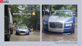 rolls royce stuck in flooded road Kolkata