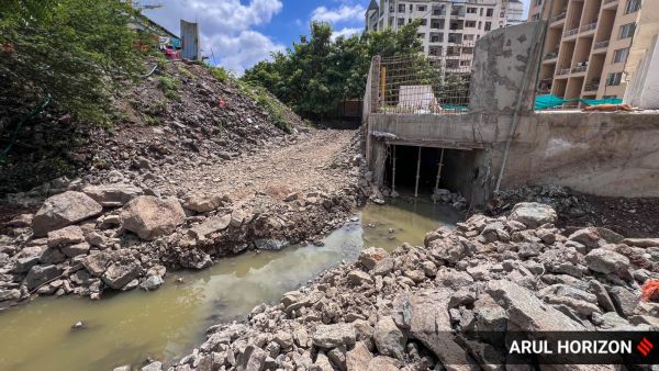 After complaints and PMC intervention, water has been chanelised to proper storm water drain near Sterling society. (Express photo by Arul Horizon)