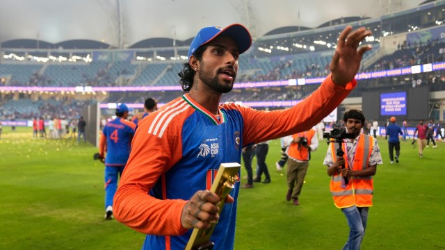 Tilak Varma greets fans after India won the Asia Cup final against Pakistan in Dubai (AP Photo)