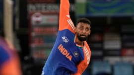 Chakaravarthy returned figures of 1/4 in India's tournament opener against the hosts and backed that up with an equally impressive haul of 1/24 from four overs in the commanding victory over Pakistan four days later. (AP Photo)