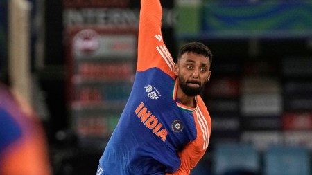 Chakaravarthy returned figures of 1/4 in India's tournament opener against the hosts and backed that up with an equally impressive haul of 1/24 from four overs in the commanding victory over Pakistan four days later. (AP Photo)