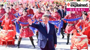 Crowds perform for Chinese President Xi Jinping at the airport of Xinjiang’s Urumqi city.