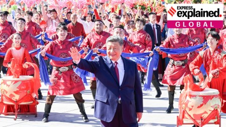 Crowds perform for Chinese President Xi Jinping at the airport of Xinjiang’s Urumqi city.