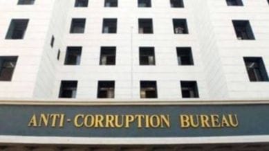 surat, acb, tax officials,