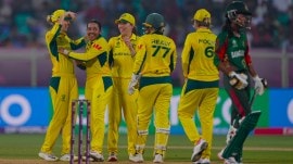 Australia's Alana King celebrates with teammates the wicket of Bangladesh's Shorna Akter during the ICC Women's Cricket World Cup match between Australia and Bangladesh at ACA–VDCA Cricket Stadium in Visakhapatnam, India, Thursday, Oct. 16, 2025. (AP Photo)