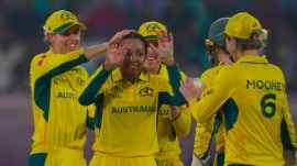 Alana King celebrates with Australia teammates after taking the wicket of Bangladesh's Shorna Akter during the ICC Women's Cricket World Cup match between Australia and Bangladesh at ACA–VDCA Cricket Stadium in Visakhapatnam. (AP Photo)