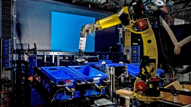 An Amazon’s Sparrow robotic arm at the Amazon facility in Shreveport, La., Oct. 10, 2025. Amazon is building robots that do everything from moving individual shirts and bottles of soap to neatly stacking packages for the shipping dock. Amazon executives hope these robots will help the company avoid hiring hundreds of thousands of employees in the coming years. (Emily Kask/The New York Times)