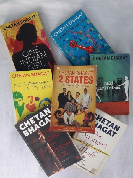 Book covers of famous Chetan Bhagat Books including 2 States, One Indian Girl, Half Girlfriend and One Arranged Murder 