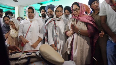 Haryana IPS officer cremated, Y Puran Kumar suicide, Haryana IPS officer suicide note, caste based discrimination IPS officer, Y Puran Kumar final note, IPS officer mental harassment, Haryana police senior officers named, Amneet P Kumar IAS, IPS officer suicide Chandigarh, IPS officer denied leave father death, caste discrimination in police service, Y Puran Kumar will declaration, IPS officer suicide Haryana cadre, Chandigarh Police investigation IPS officer death, IPS officer public humiliation case, IPS officer suicide caste bias, IPS officer suicide news India, IPS officer suicide note Indian Express, Y Puran Kumar assets will, IPS officer suicide justice demanded, Amneet P Kumar refuses post mortem