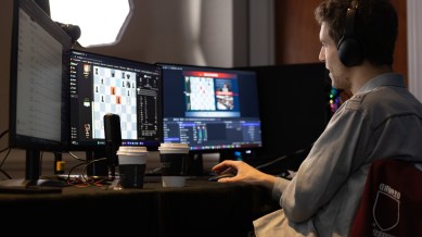 This undated photo released by Charlotte Chess Center shows Daniel Naroditsky playing chess at the computer. (Kelly Centrelli/Charlotte Chess Center via AP)