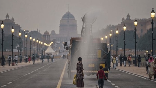 Delhi air quality: An anti-smog gun sprays water from a sprinkler along the Kartavya Path in Delhi.