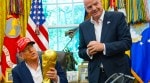 File image of US President Donald Trump holding the FIFA World Cup Winners Trophy as FIFA President Gianni Infantino looks on during an announcement in the Oval Office of the White House. (AP Photo)