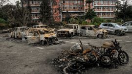 Burned vehicles in front of government buildings in Kathmandu, Nepal, Sept. 12, 2025. (Atul Loke/The New York Times)