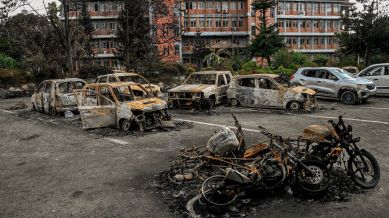 Burned vehicles in front of government buildings in Kathmandu, Nepal, Sept. 12, 2025. (Atul Loke/The New York Times)