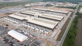 The new Amazon Web Services facility in New Carlisle, Ind., where the tech giant plans to build around 30 data centers, June 4, 2025. After unexpectedly strong sales and profits across its consumer and cloud businesses, the tech giant said another strong quarter might be ahead. (Image: New York Times)