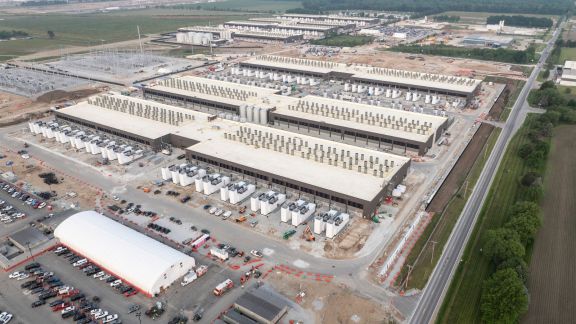 The new Amazon Web Services facility in New Carlisle, Ind., where the tech giant plans to build around 30 data centers, June 4, 2025. After unexpectedly strong sales and profits across its consumer and cloud businesses, the tech giant said another strong quarter might be ahead. (Image: New York Times)