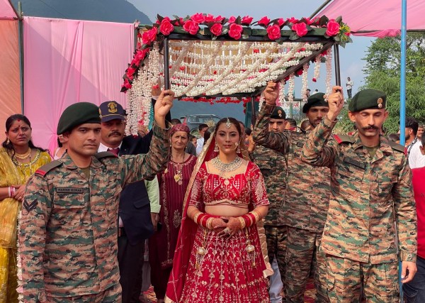 Personnel of 19 Grenadiers Battalion escorting the bride till the stage. (Express Photo)