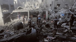 Hamas hands over two hostage bodies as Israel continues to strike Gaza