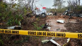 Kenyan officials inspect the scene of a plane crash near Diani, Kenya, Tuesday, Oct. 28, 2025. (AP Photo)