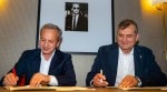 FIDE President Arkady Dvorkovich (left) and CEO of Norway Chess Kjell Madland sign the agreement for the Total Chess World Championship Tour. (PHOTO: Norway Chess)