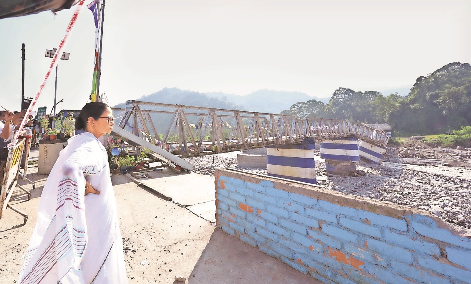Chief Minister Mamata Banerjee at the Dudhiya bridge, which collapsed during Saturday’s rainfall, in Mirik