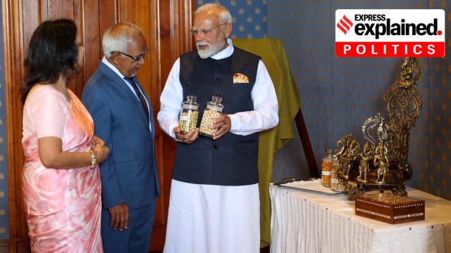 Prime Minister Narendra Modi presenting makhana to Mauritius President Dharambeer Gokhool at Port Louis, in Mauritius on March 11, 2025. (PIB)