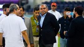 Pakistan's Minister of Interior and President of the Asian Cricket Council Mohsin Naqvi, center, stands with officials on the field after India won the Asia Cup cricket final against Pakistan at Dubai International Cricket Stadium, United Arab Emirates, Sunday, Sept. 28, 2025. (AP Photo)