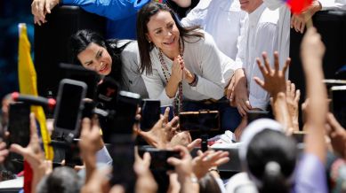 Maria Corina Machado leads a protest against the reelection of President Nicolás Maduro one month after the disputed presidential vote which she claims the opposition won by a landslide, in Caracas, Venezuela, Wednesday, Aug. 28, 2024. (AP Photo/Cristian Hernandez, File)