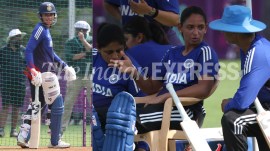 L-R: India's Smriti Mandhana and Harmanpreet Kaur with coach Amol Muzumdar during practice session ahead of World Cup game vs New Zealand. (Express Photo by Amit Chakravarty)