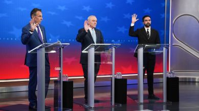 From left, Independent candidate former New York Gov. Andrew Cuomo, Republican candidate Curtis Sliwa and Democratic candidate Zohran Mamdani participate in a mayoral debate, Thursday, Oct. 16, 2025, in New York. (AP Photo/Angelina Katsanis, Pool)