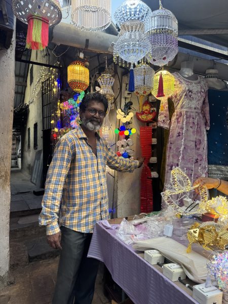 Navneet Gopinath Kaleskar, who specialises in festive lights and hanging kandils, showcases his latest attraction — a bright red e-ladi.