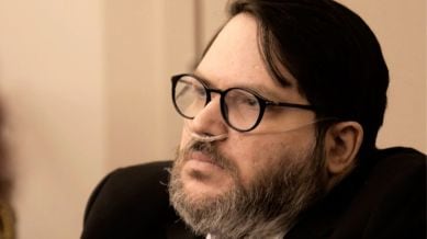 FILE - In this image made from pool video footage, Nicholas Rossi, accused of faking his death and fleeing to Europe to avoid rape charges, appears at a jury trial in Salt Lake City, Aug. 11, 2025. (Firecrest Films via AP, Pool, File)