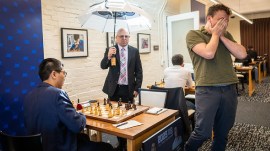 Hans Niemann Wesley So umbrella sunlight